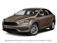 2015 Ford Focus 4Dr Sdn SE Tectonic Metallic  Shot 4